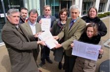 Peter Neal (left) and campaigners hand over a petition to local MP Oliver Letwin (third left)