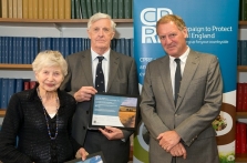 Claire Cox and Kevin FitzGerald receive their award from Sir Andrew Motion (far right)